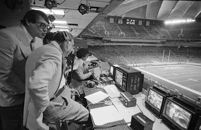Cosell (center), with later MNF partners Alex Karras (left) and Frank Gifford, in 1975.